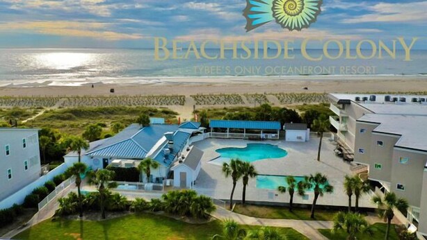 A resort with a pool, beach view, and a logo for Beachside Colony. - Summer & July 4th Savings at Beachside Colony Tybee's ONLY Oceanfront Resort 2/2 (Tybee Island)