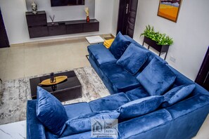 Apartment | Living room | 30-inch TV with digital channels - Beautiful One Bed Apartment in Lekki Phase1 (Lekki)