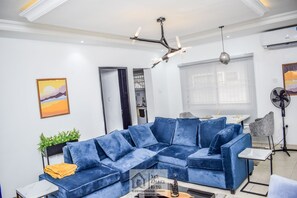 Apartment | Living room | 30-inch TV with digital channels - Beautiful One Bed Apartment in Lekki Phase1 (Lekki)