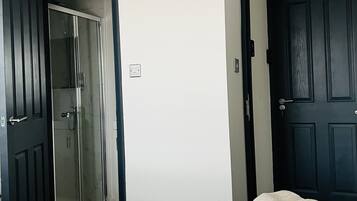 1 bedroom, desk, iron/ironing board, travel crib