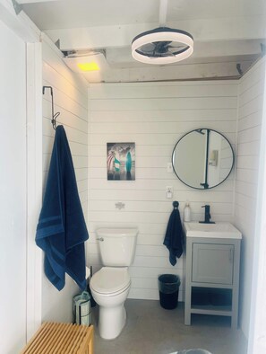 Bathtub, hair dryer, towels