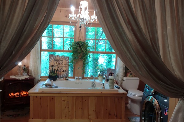 Bañera con ducha, secador de pelo, toallas, jabón