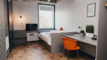 Economy Room | Blackout drapes, iron/ironing board, free WiFi, bed sheets