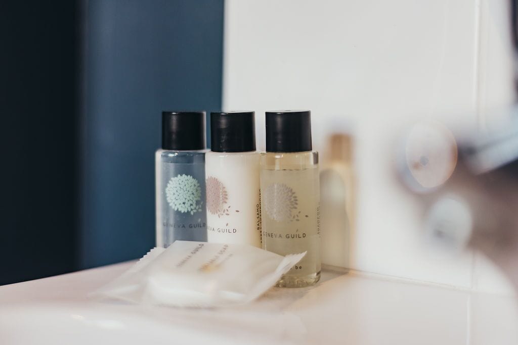 economy room | bathroom | shower, hair dryer, towels, soap