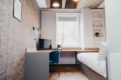 Economy Room | Blackout curtains, free WiFi, bed sheets
