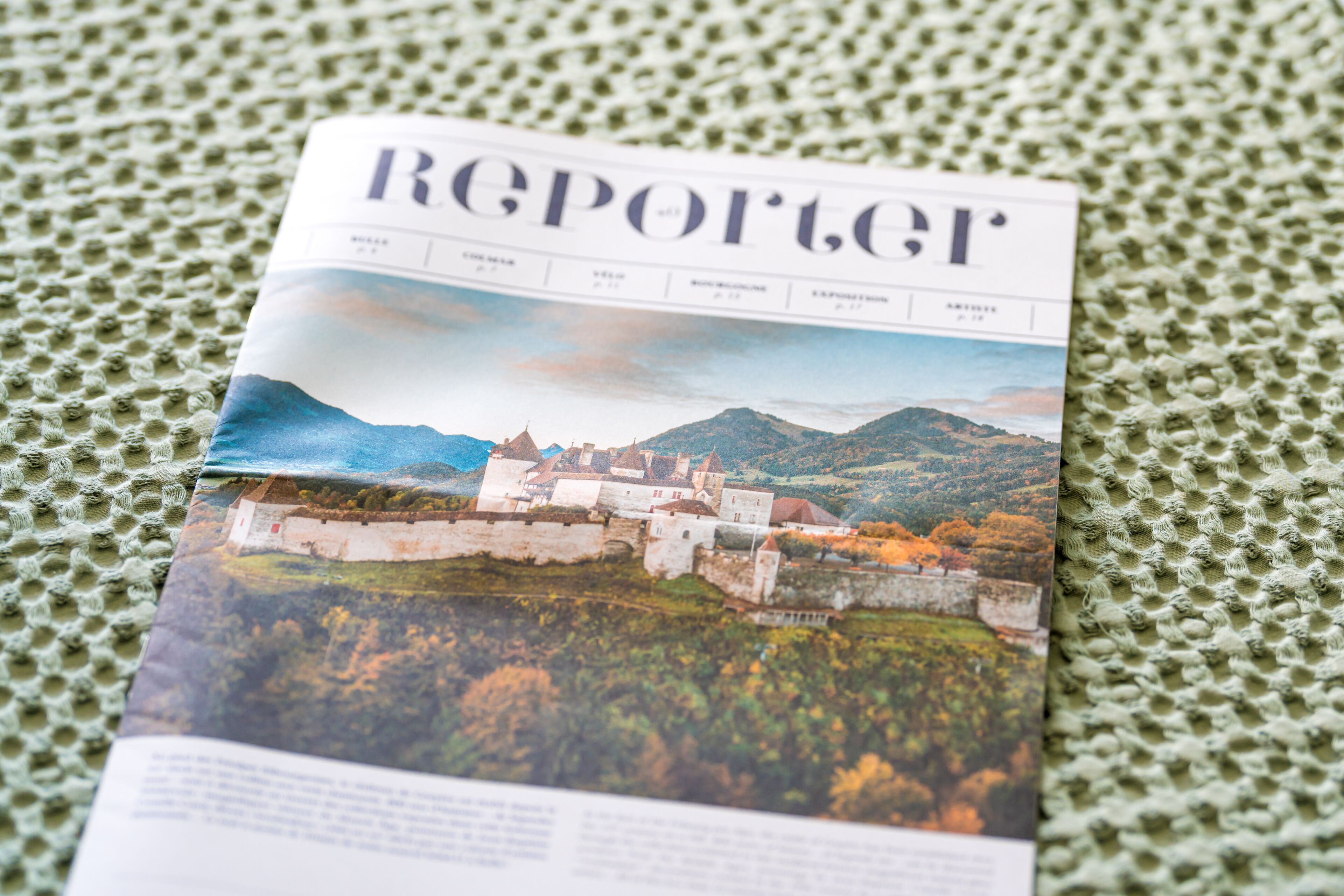 A magazine with a castle on the cover.
