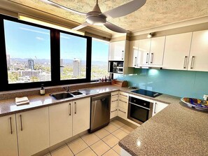 Fridge, microwave, oven, stovetop - Surfers Paradise Beachfront Pool and Views (Surfers Paradise)