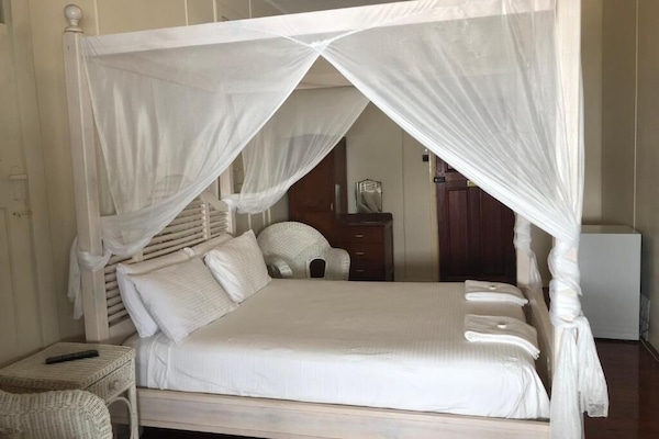 Standard Room, 1 King Bed, Shared Bathroom | Free WiFi