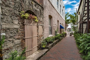 Stroll through this charming, historic neighborhood, lined with lush greenery and picturesque buildings.