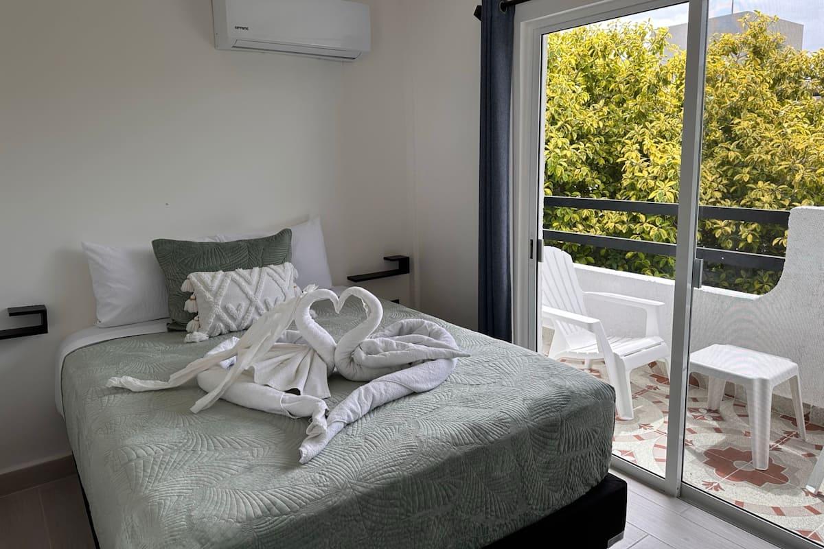 1 bedroom, desk, laptop workspace, blackout curtains