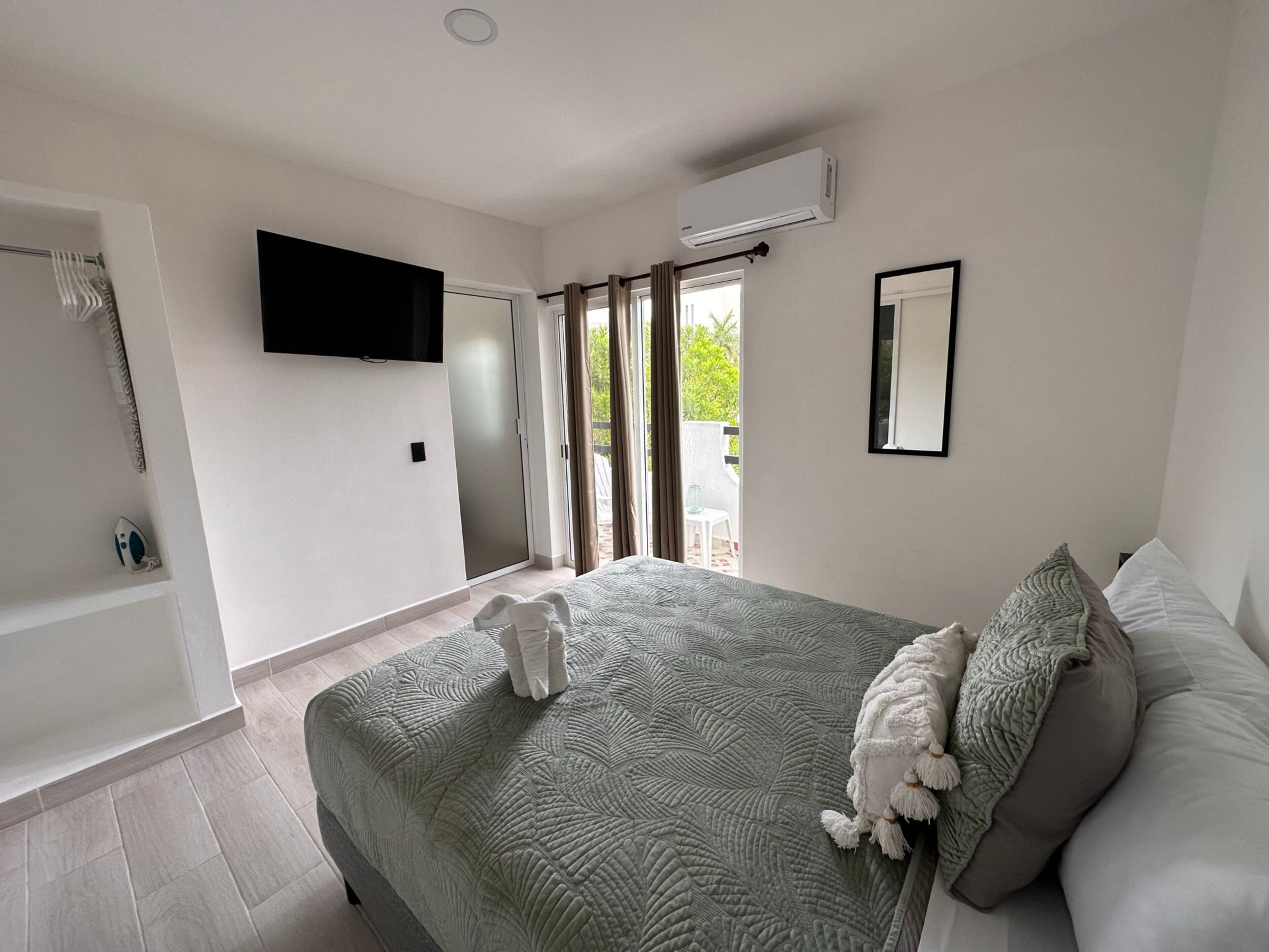 Superior Studio Suite | Desk, laptop workspace, blackout curtains, iron/ironing board