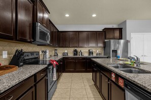 Fridge, microwave, oven, stovetop - Private Pool Villa • Free Wi-Fi • Gated Resort Near Disney Game Room (Kissimmee)