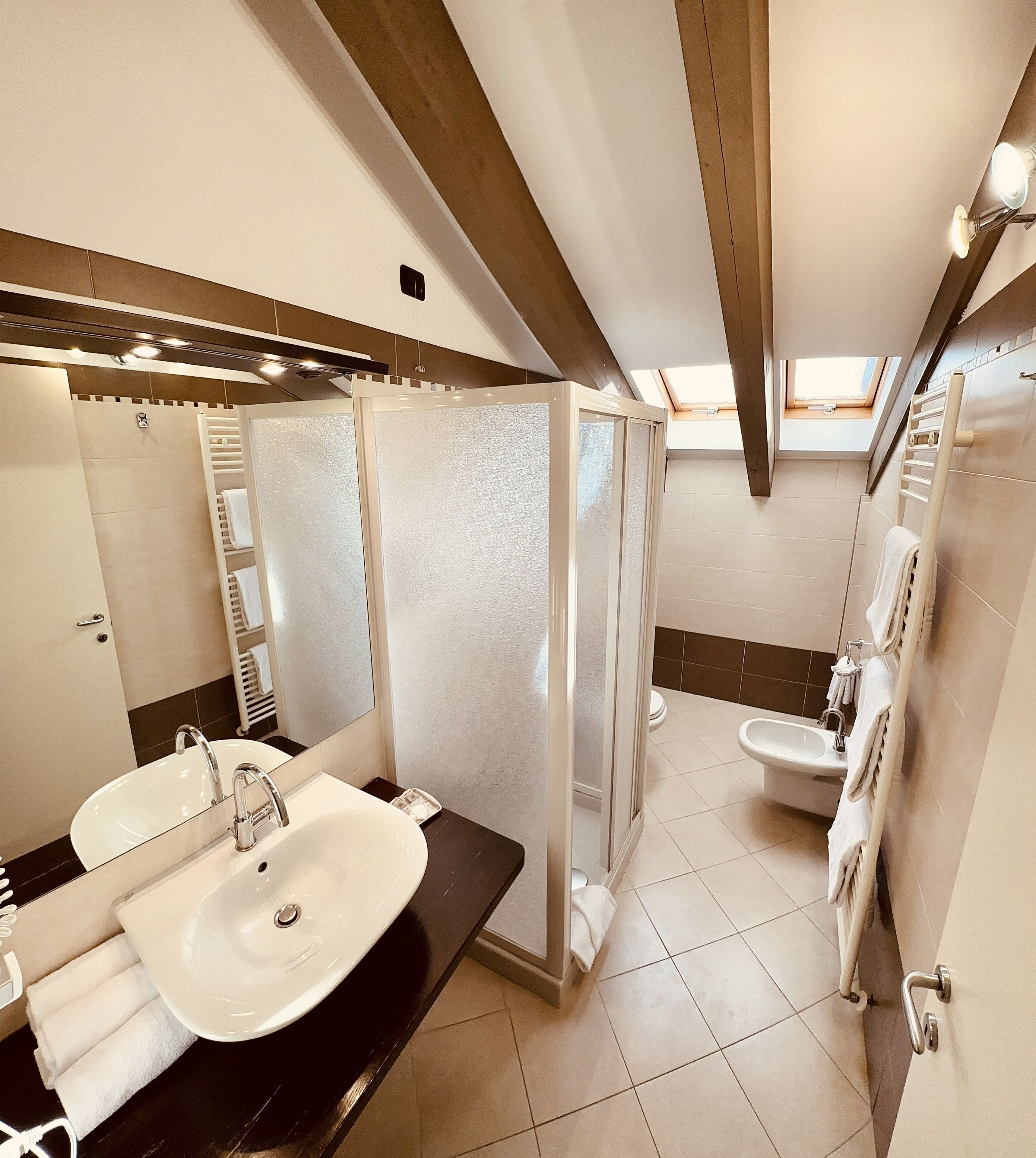 jetted bath, rainfall showerhead, free toiletries, hair dryer