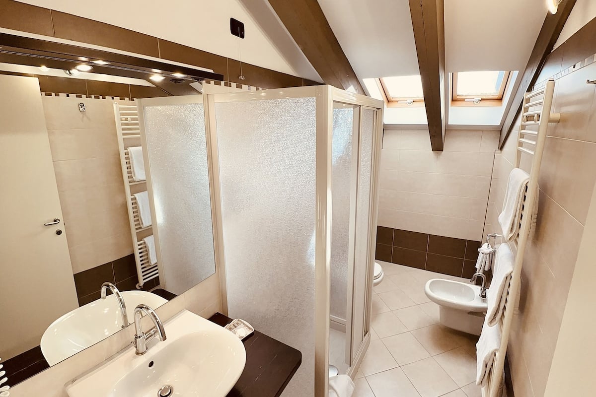 jetted bath, rainfall showerhead, free toiletries, hair dryer