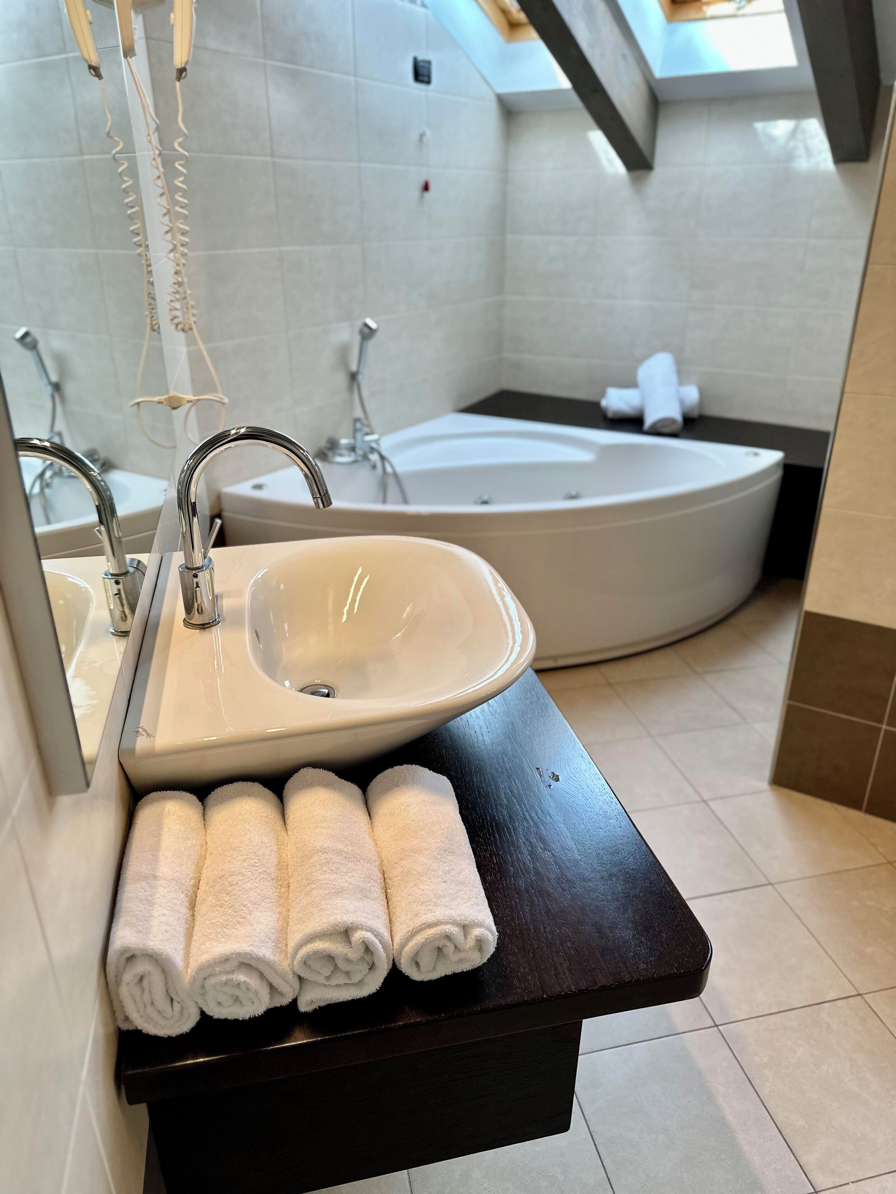 junior suite, 1 bedroom, accessible, garden view | bathroom | jetted bath, rainfall showerhead, free toiletries, hair dryer