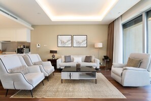 Comfort Apartment | Living area | 53-inch Smart TV with cable channels, TV - SuperHost EMAAR Residences Apartments - Address Dubai Mall (Dubai)