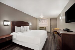 Habitación individual estándar | Cortinas opacas, wifi gratis, ropa de cama