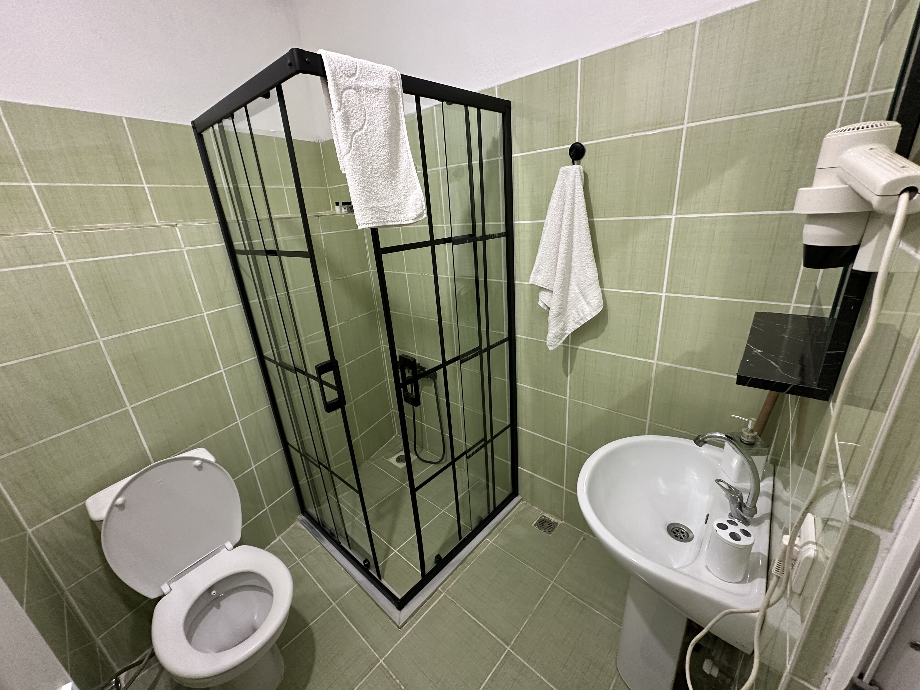 Family Apartment | Bathroom | Shower, hair dryer, towels, soap
