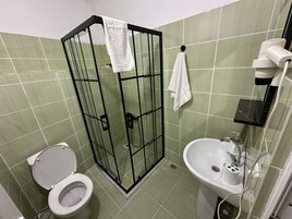 Family Apartment | Bathroom | Shower, hair dryer, towels, soap