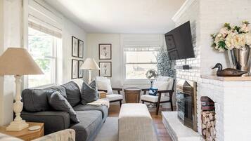 TV, fireplace, books, offices