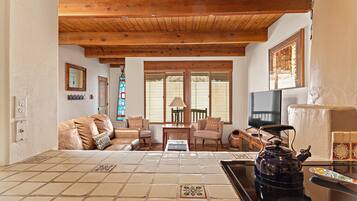 Smart TV, fireplace, DVD player, books