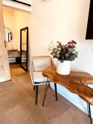 Deluxe Double Room | Living area | 50-inch Smart TV with digital channels, TV - Tatala Hotel Boutique (Tepoztlán)