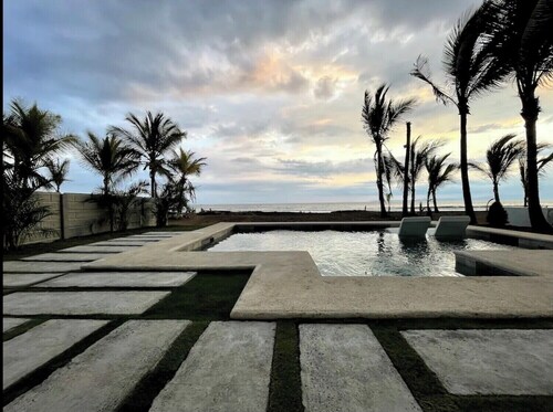 Stunning contemporary beach front villa