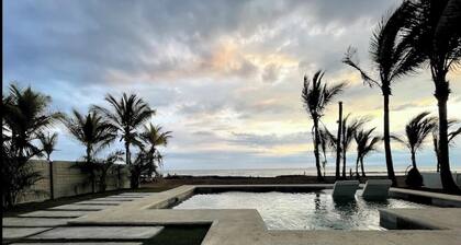 Stunning contemporary beach front villa