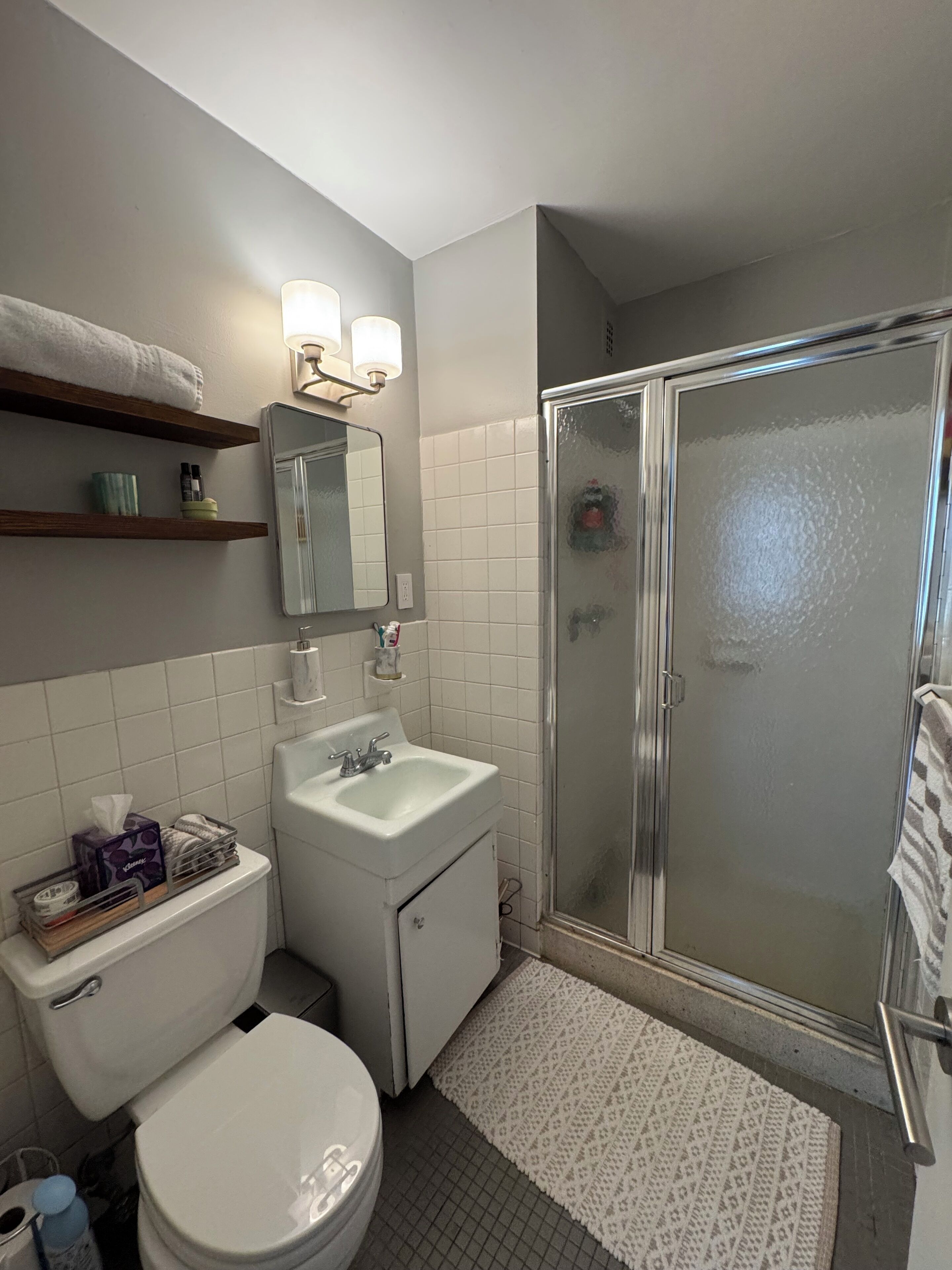 Bathtub, hair dryer, towels, soap