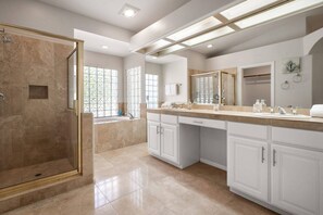 Combined shower/tub, hair dryer, towels, shampoo