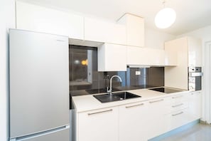 Apartment (Two Bedroom Apartment with Balcony) | Private kitchen | Fridge