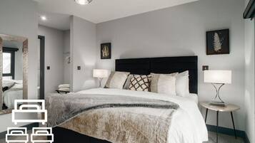 2 bedrooms, desk, iron/ironing board, travel crib