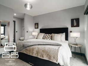 2 habitaciones, escritorio y tabla de planchar con plancha 