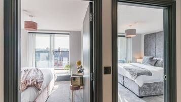 2 bedrooms, desk, iron/ironing board, travel crib