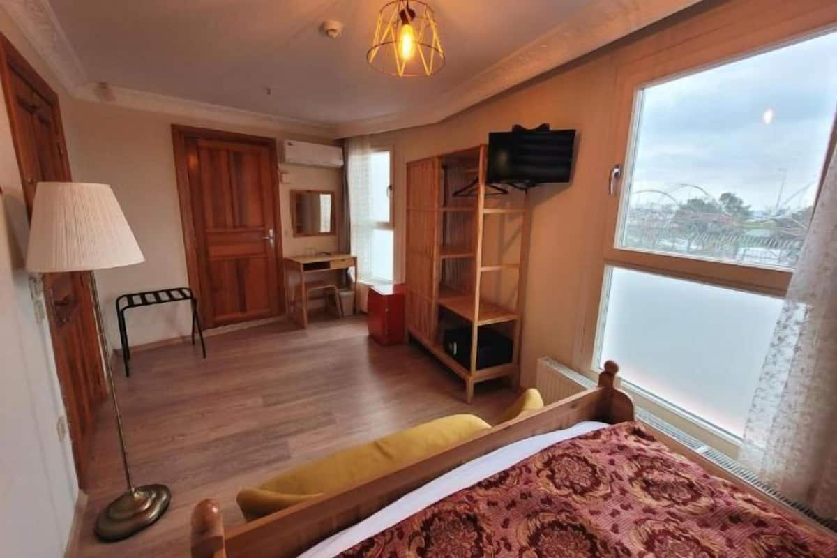 2 habitaciones, minibar, wifi gratis y ropa de cama