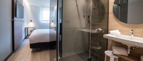 Shower, rainfall showerhead, towels, soap