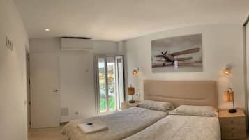 2 dormitorios, tabla de planchar con plancha, wifi gratis y ropa de cama