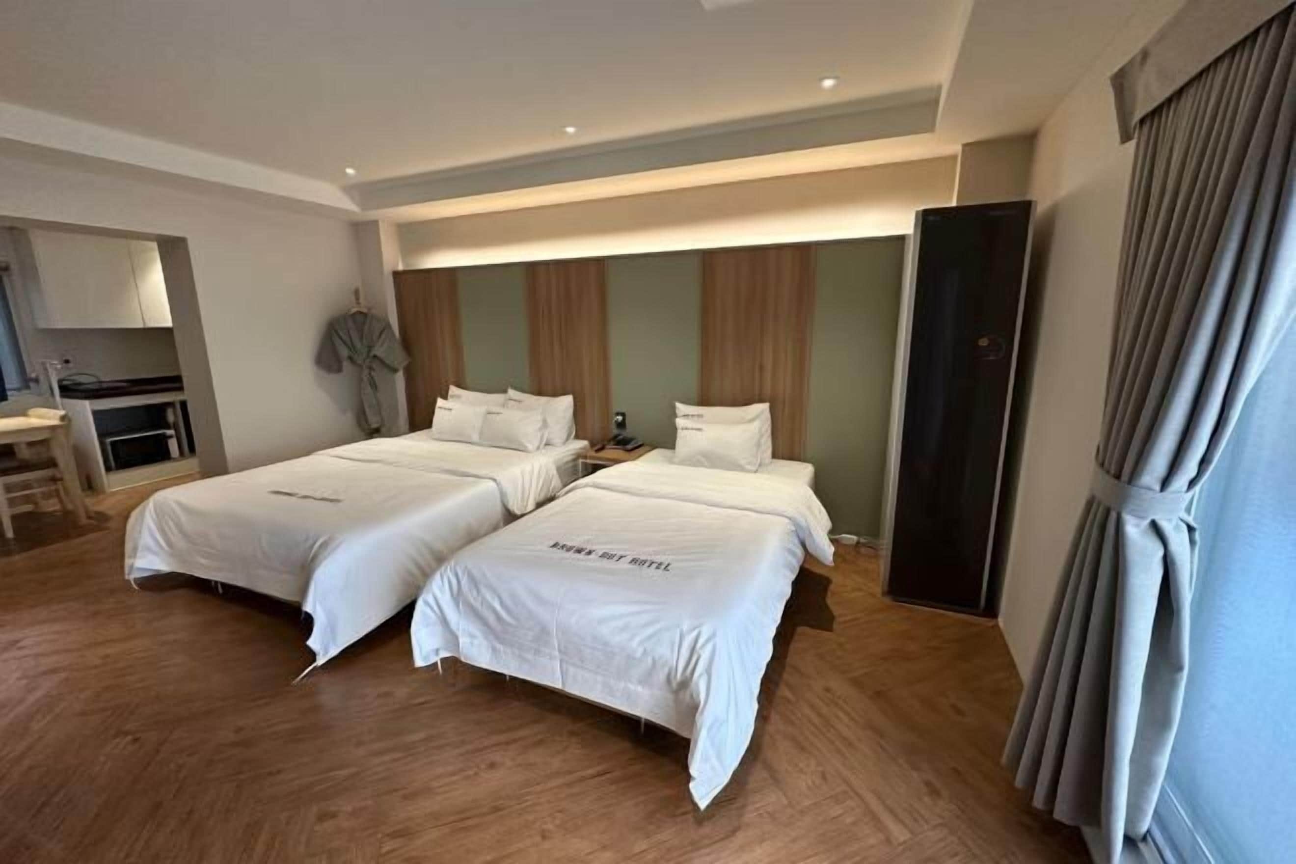 Premium bedding, down comforters, pillowtop beds, minibar