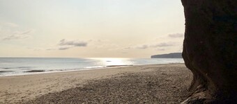 Stunning Coastal Cottage - Sleeping 8 in 4 Bedrooms - Pool and Beach Access Included.