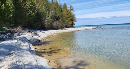A private ranch home on Lake Michigan with stunning sunrise views.