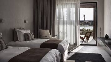 Chambre Double Deluxe | Draps en coton égyptien, literie de qualité supérieure, minibar