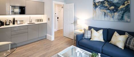 Suite, 1 Bedroom | Living area | 42-inch Smart TV with digital channels, TV