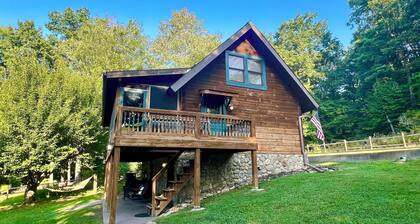 Enjoy a CABIN including Blueberry Picking, Yard Games, Fire Pit, Screened Porch.