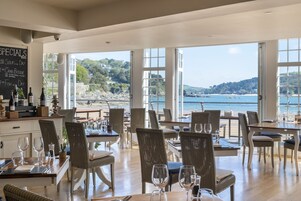 Breakfast, lunch, dinner served; beach views