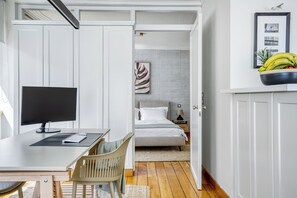 1 bedroom, desk, iron/ironing board, travel cot