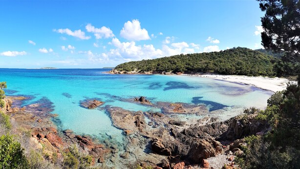 A coastal landscape with clear turquoise waters, rocky shorelines, and a sandy beach. - Casa di Toro, facing the sea, rated 4 *, swimming pools, Palombaggia beaches 1.9KM. (Porto-Vecchio)