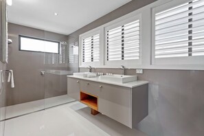 Bathtub, hair dryer, towels