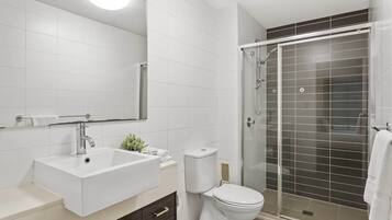 Bathtub, hair dryer, towels