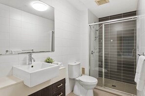 Bathtub, hair dryer, towels