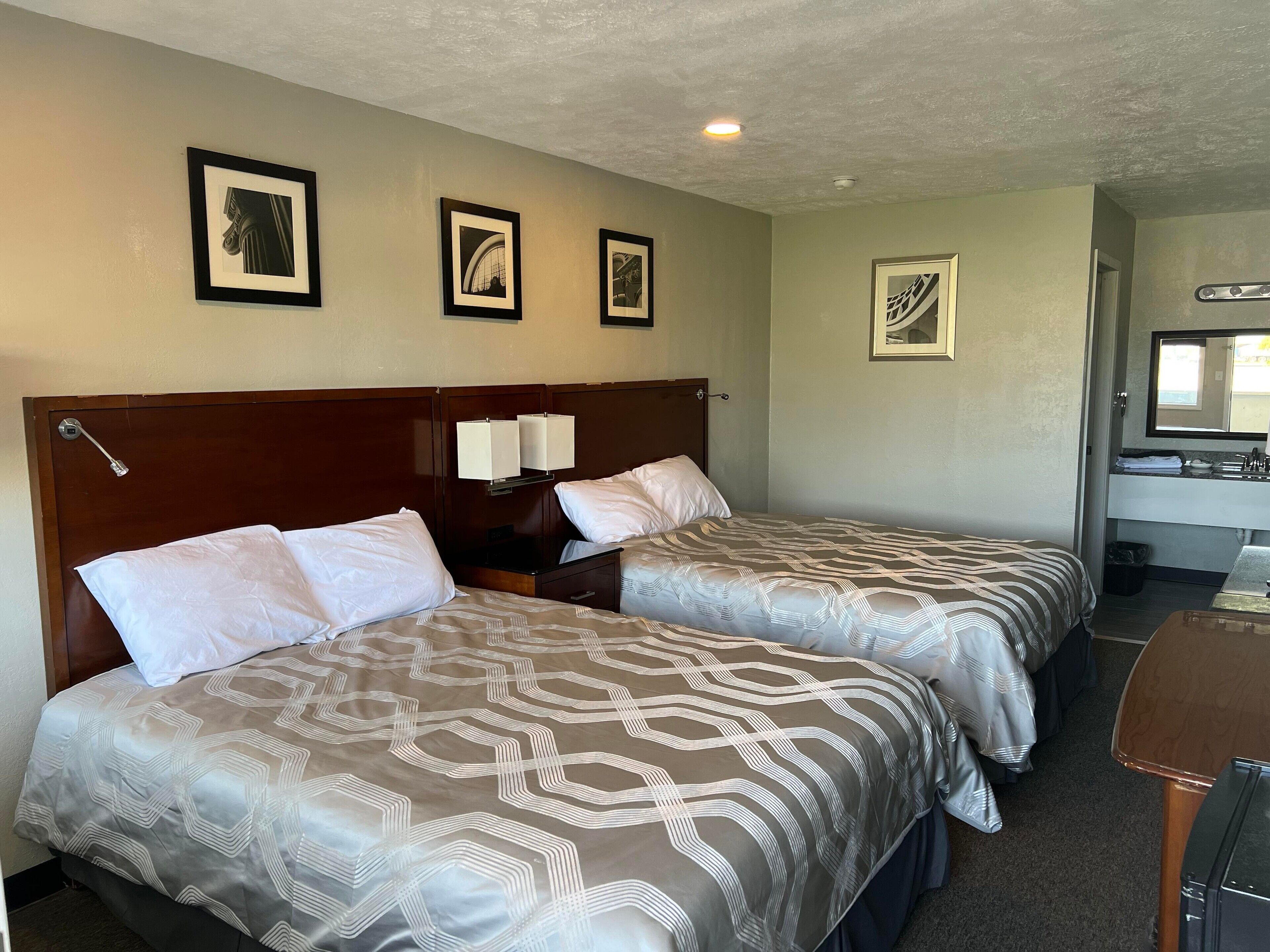 Pillowtop beds, blackout drapes, iron/ironing board, free WiFi